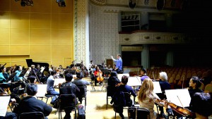Rehearsing with the Kazakh State Symphony Orchestra in the Bolshoi Concert Hall of the Kazakh State Symphony Orchestra, 2015